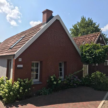 Ferienhaus Wattwurm Rysum Buitenkant foto