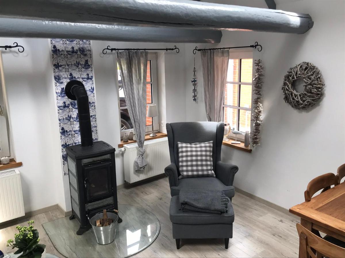 Ferienhaus Wattwurm Rysum Buitenkant foto