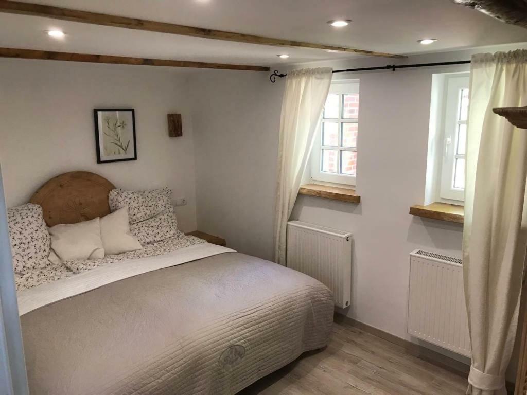 Ferienhaus Wattwurm Rysum Buitenkant foto