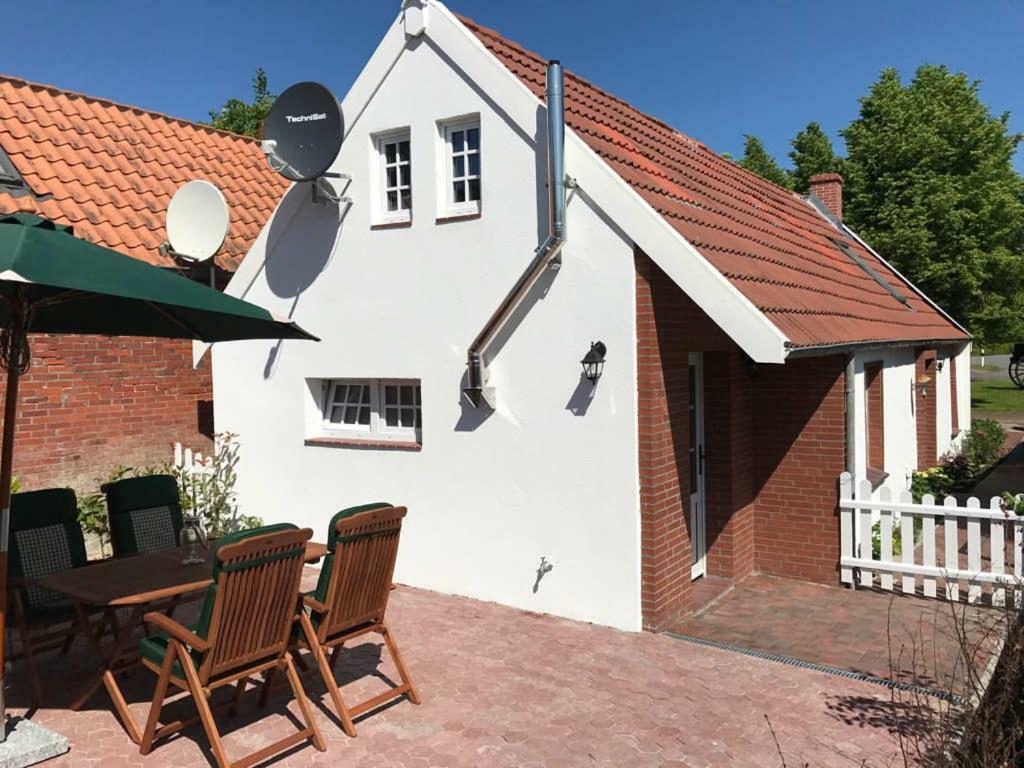 Ferienhaus Wattwurm Rysum Buitenkant foto