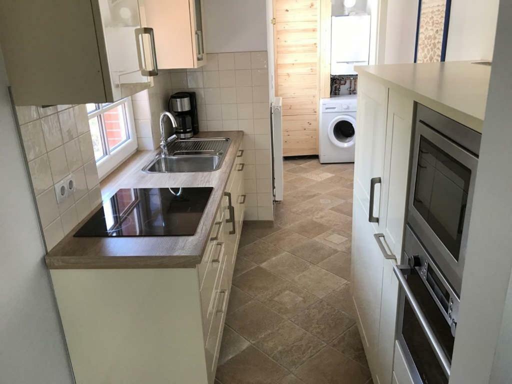 Ferienhaus Wattwurm Rysum Buitenkant foto