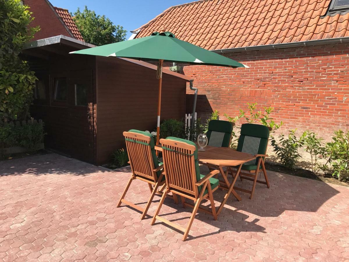 Ferienhaus Wattwurm Rysum Buitenkant foto