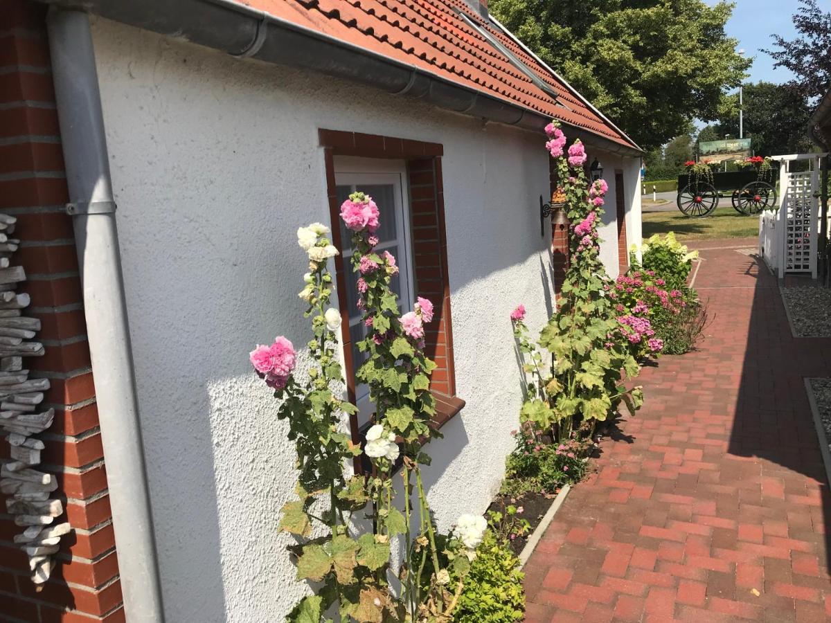 Ferienhaus Wattwurm Rysum Buitenkant foto
