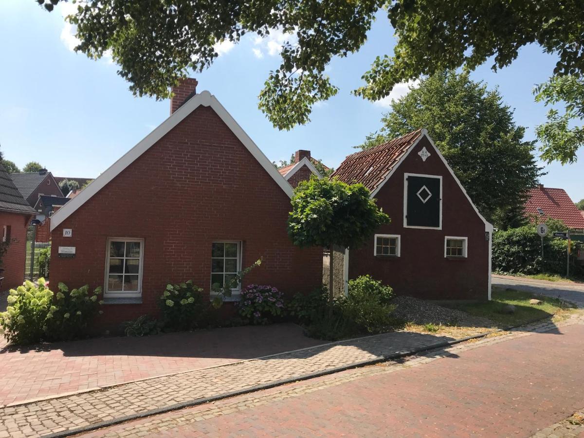 Ferienhaus Wattwurm Rysum Buitenkant foto