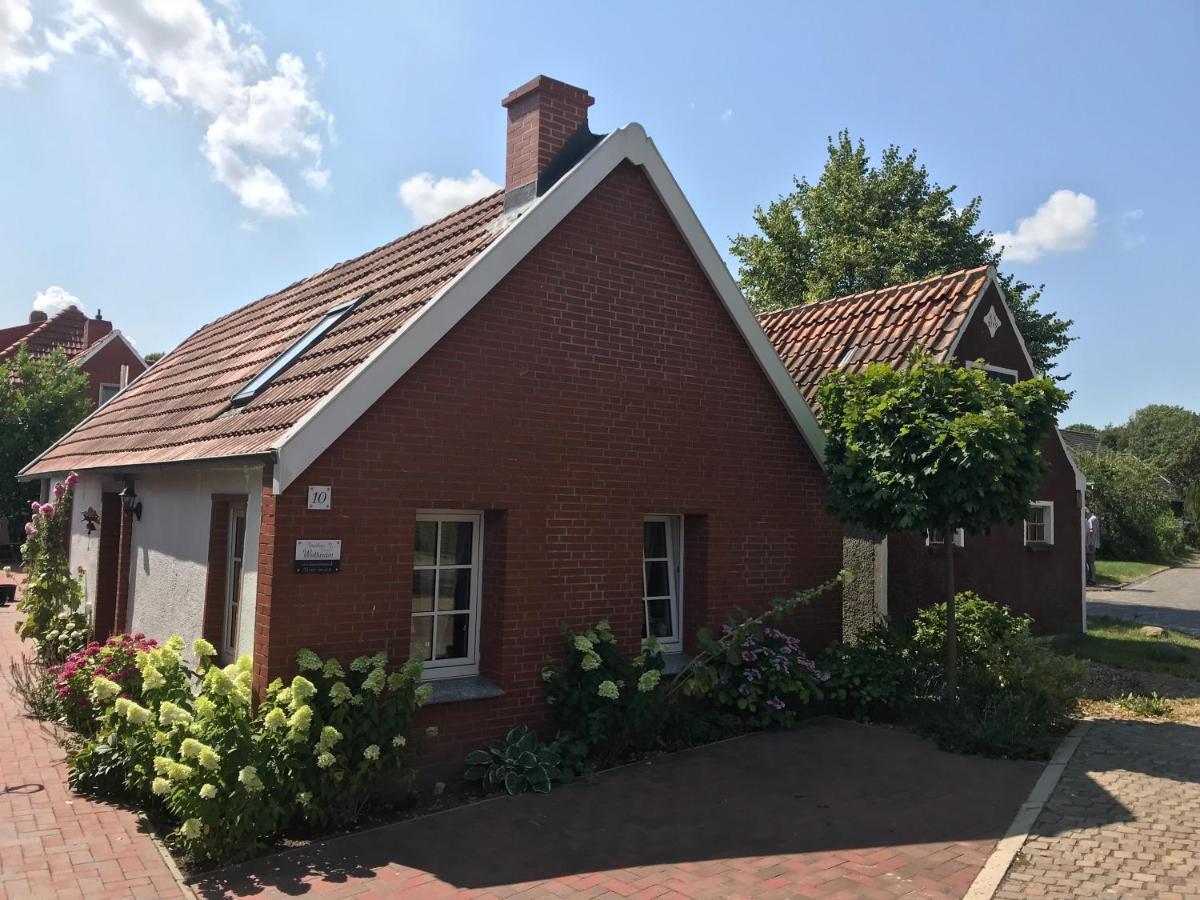 Ferienhaus Wattwurm Rysum Buitenkant foto